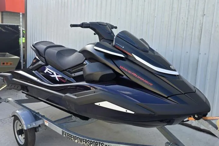 Slide: The Image of 2026 Yamaha WaveRunner FX SVHO jet ski on trailer, sleek black design. - 7