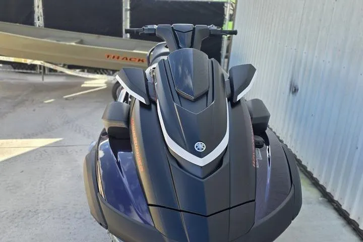Slide: The Image of 2026 Yamaha WaveRunner FX SVHO jet ski, sleek design, parked outdoors. - 8