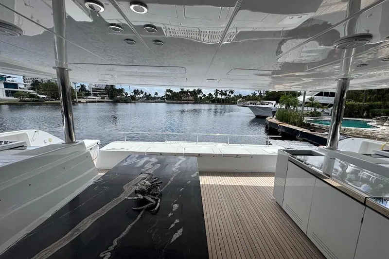 Slide: The Image of Luxurious 2015 Lagoon yacht interior with waterfront view and sleek design elements. - 10