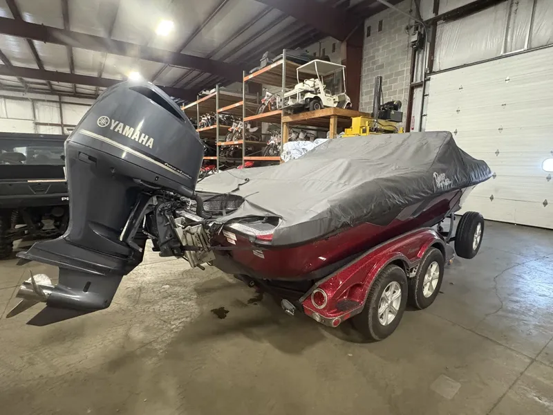 Slide: The Image of 2011 Ranger 620 VS boat with Yamaha engine in garage. - 11