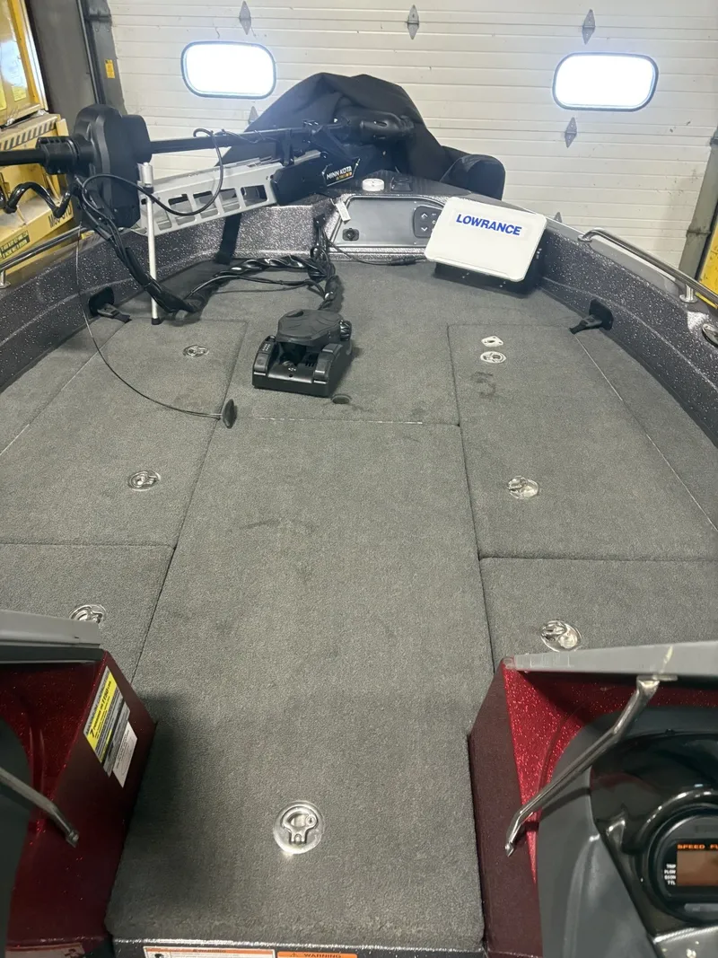 Slide: The Image of Interior view of a 2011 Ranger 620 VS boat with Lowrance equipment. - 17