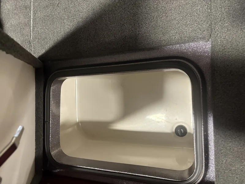 Slide: The Image of Interior view of a 2011 Ranger 620 VS boat storage compartment. - 23