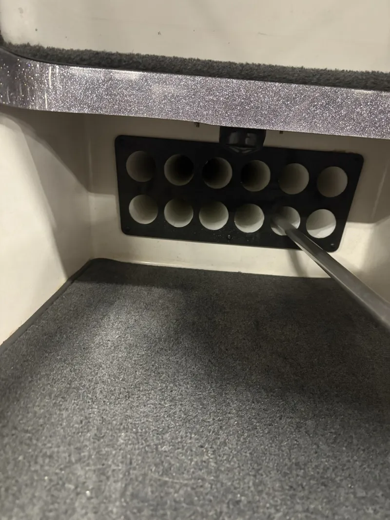 Slide: The Image of Ranger 620 VS 2011 boat interior with rod holder. - 28