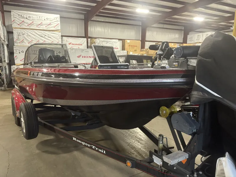 Slide: The Image of 2011 Ranger 620 VS boat in warehouse, on trailer. - 3