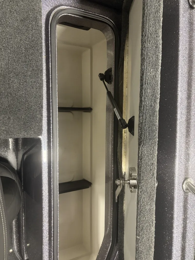 Slide: The Image of Interior view of a 2011 Ranger 620 VS boat storage compartment. - 31