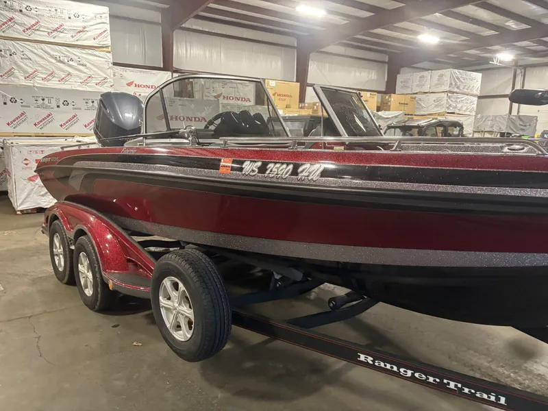 Slide: The Image of 2011 Ranger 620 VS boat in warehouse on trailer. - 4