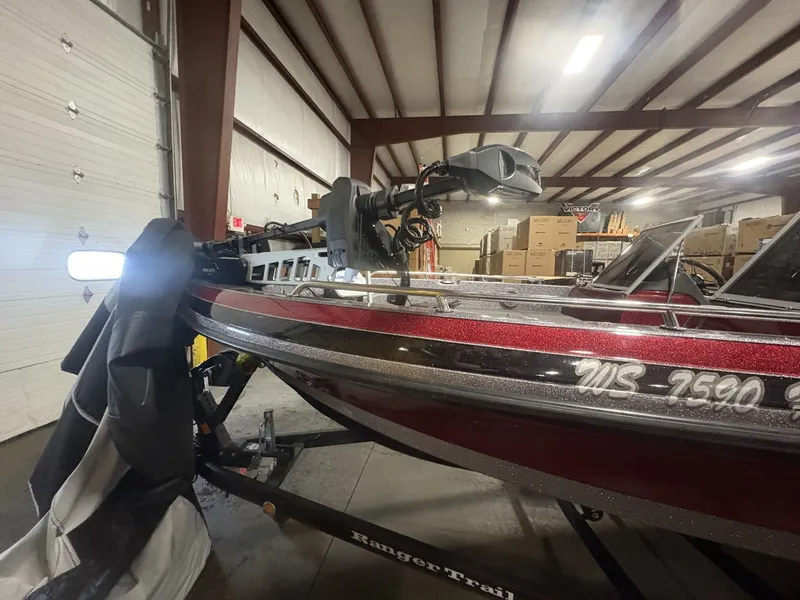 Slide: The Image of 2011 Ranger 620 VS boat in warehouse, side view. - 7