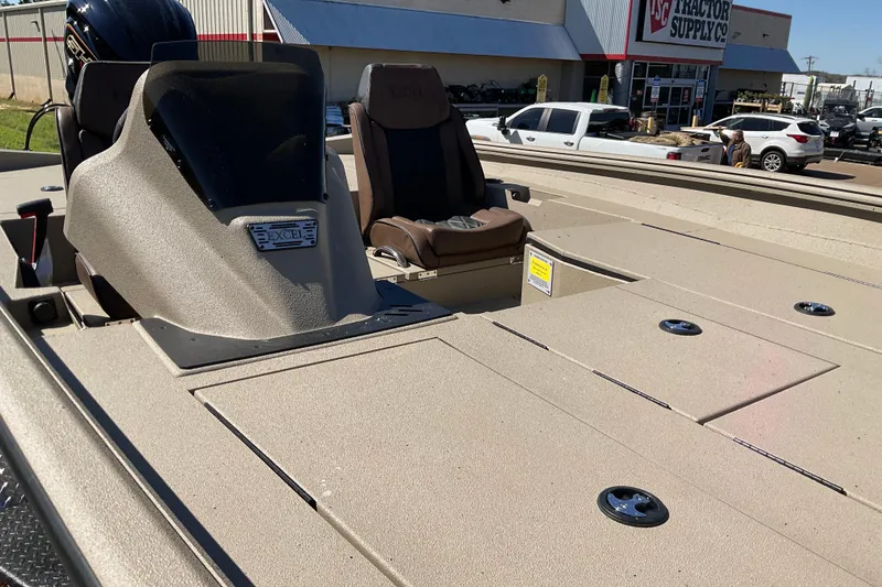 Slide: The Image of 2026 Excel EX 203 boat at Tractor Supply Co. parking lot. - 6