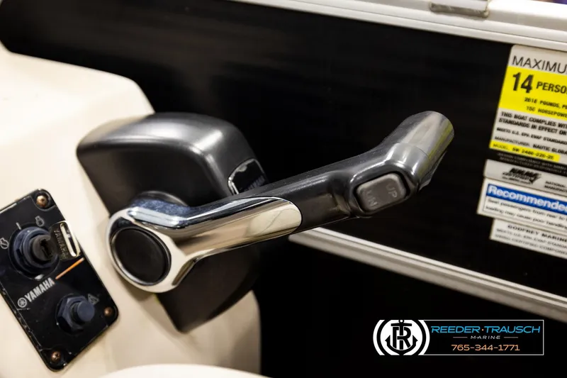 Slide: The Image of Close-up of a 2011 Godfrey SW2486 boat throttle control with Yamaha ignition. - 35