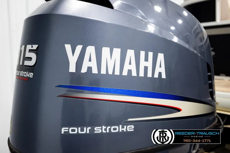 Slide: The Image of Yamaha 115 four-stroke engine cover, featuring Reeder-Trausch Marine branding. Godfrey SW2486, 2011 model. - 41