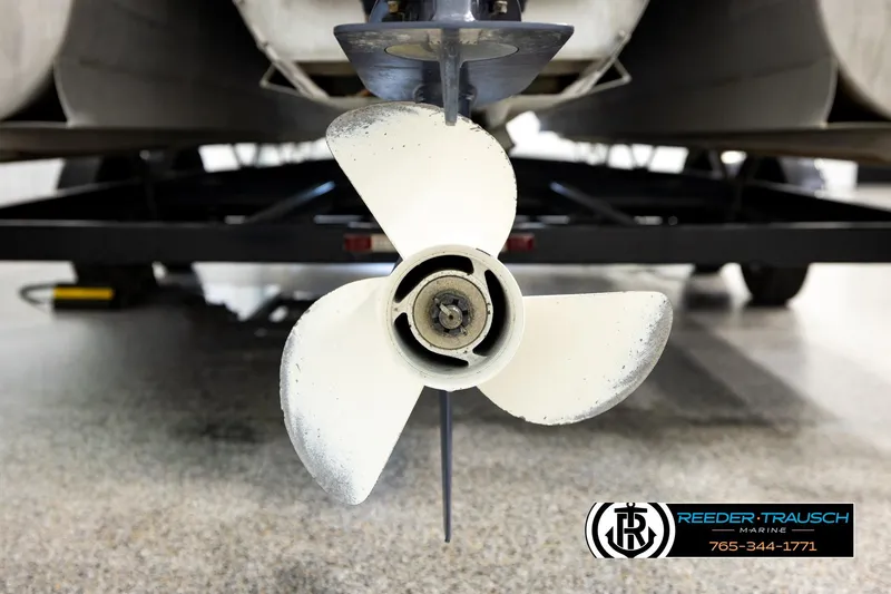 Slide: The Image of Close-up of a 2011 Godfrey sw2486 boat propeller on a trailer. - 43