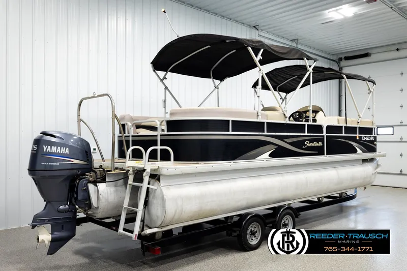 Slide: The Image of 2011 Godfrey SW2486 pontoon boat with Yamaha motor in indoor showroom. - 6
