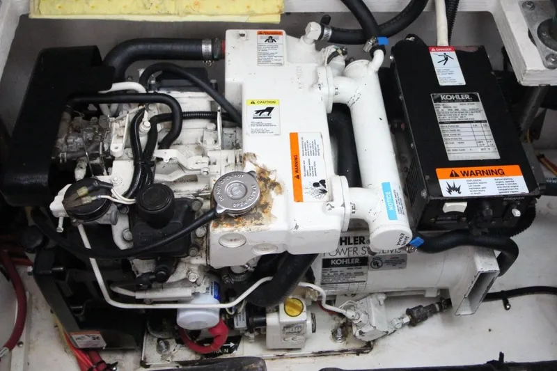 Slide: The Image of Engine compartment of 2004 Cruisers Yachts 320 Express with Volvo Penta 5.7 GXI engines. - 20