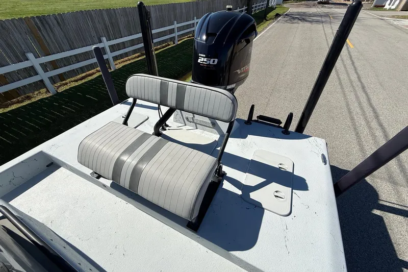 Slide: The Image of JH Performance boat with 250 horsepower engine and dual seat on deck. - 7