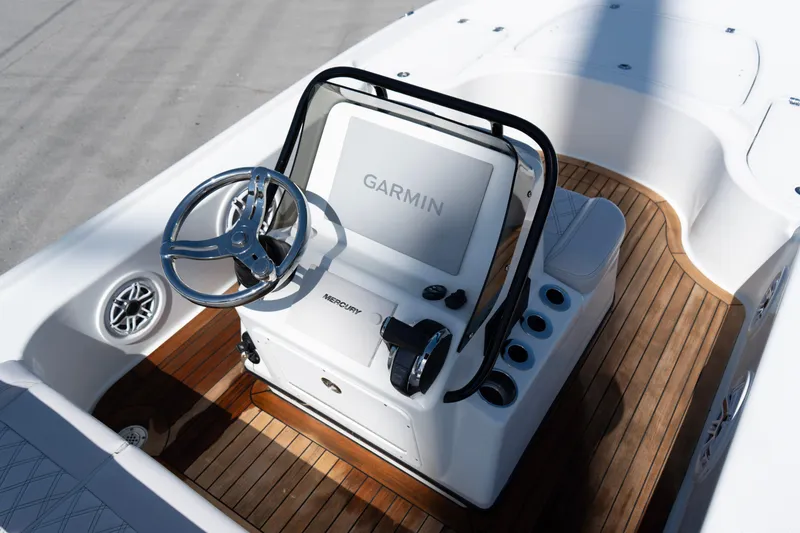 Slide: The Image of 2020 Yellowfin 21 Hybrid boat console with Garmin display and Mercury controls. - 5