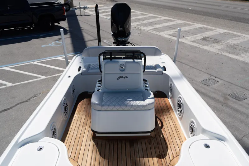 Slide: The Image of 2020 Yellowfin 21 Hybrid boat with sleek interior and wood flooring. - 7