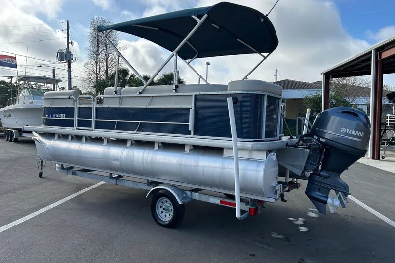 Slide: The Image of 2020 Godfrey SR 206 C pontoon boat with Yamaha outboard motor on trailer. - 4
