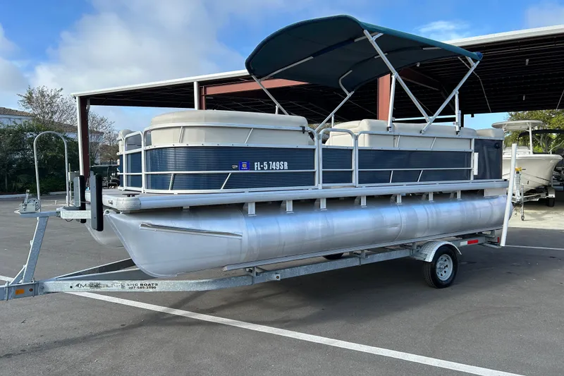 Slide: The Image of 2020 Godfrey SR 206 C pontoon boat on trailer in parking lot. - 5
