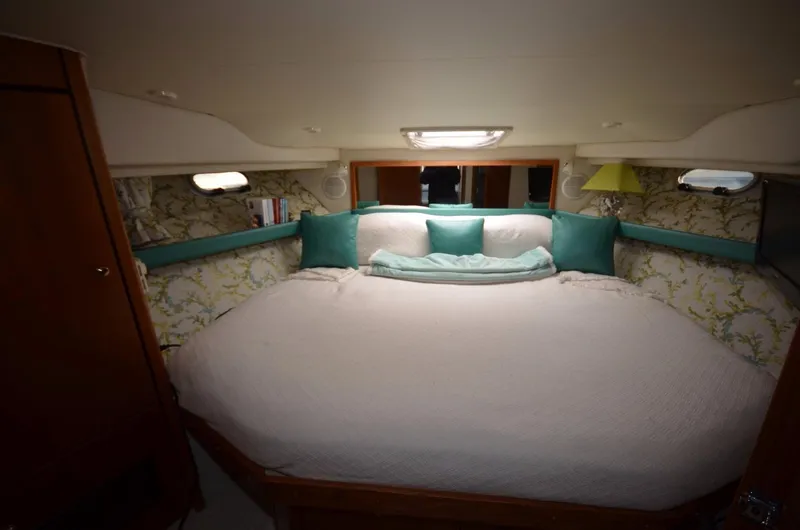 Slide: The Image of Luxurious bedroom in a 1998 Bayliner 3988 motoryacht. - 10
