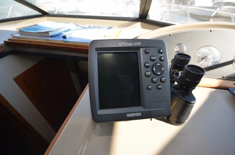 Slide: The Image of Garmin GPS on 1998 Bayliner 3988 yacht dashboard. - 21