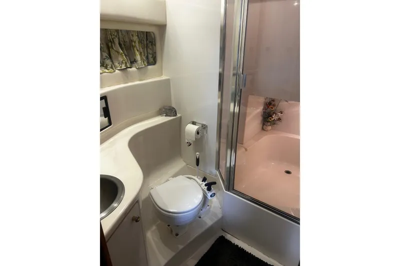 Slide: The Image of Bathroom interior of 1998 Bayliner 3988 Command Bridge Motoryacht with shower and toilet. - 37