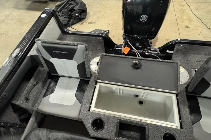 Slide: The Image of 2020 Crestliner 1850 Super Hawk boat interior with seating and storage compartments. - 14