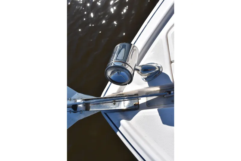 Slide: The Image of Bow of 2020 Regal 35 Sport Coupe with anchor and water reflection. - 16