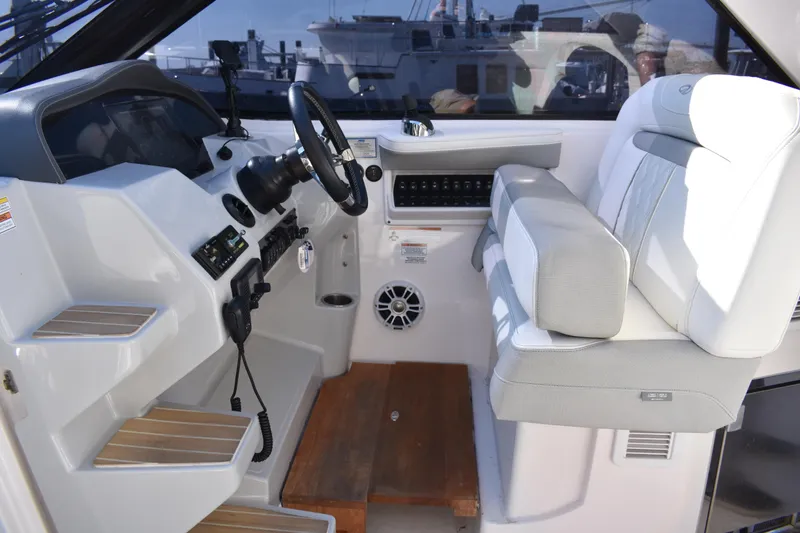 Slide: The Image of 2020 Regal 35 Sport Coupe helm with modern controls and comfortable seating. - 30
