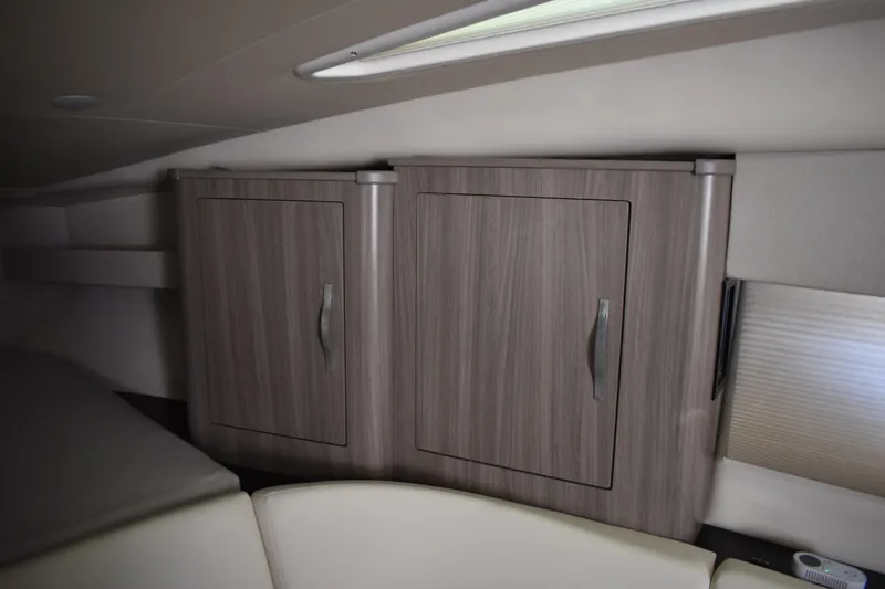 Slide: The Image of 2020 Regal 35 Sport Coupe interior with sleek wooden cabinets. - 63