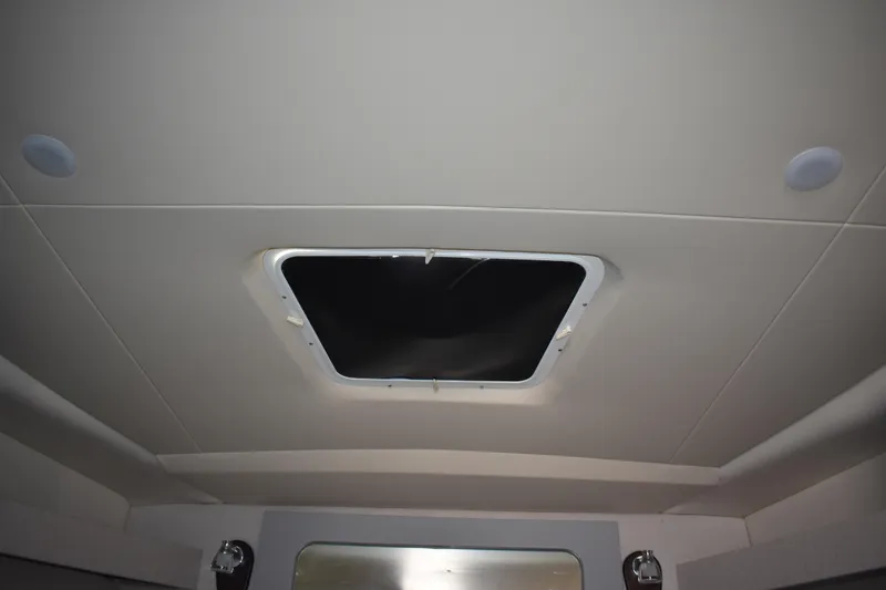 Slide: The Image of Ceiling view of 2020 Regal 35 Sport Coupe with open hatch. - 71