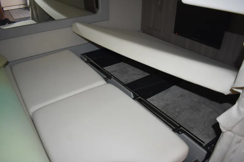 Slide: The Image of Interior cabin of 2020 Regal 35 Sport Coupe with convertible seating and storage. - 79