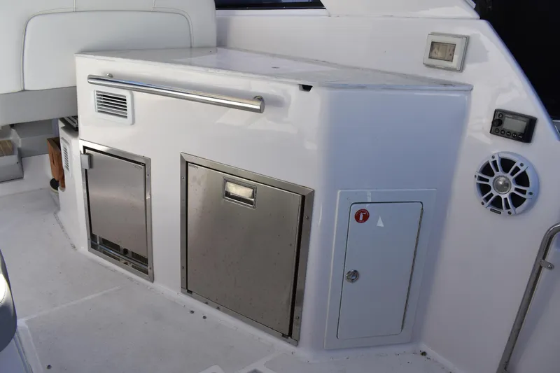 Slide: The Image of 2020 Regal 35 Sport Coupe interior with storage compartments and speaker system. - 86