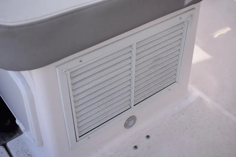 Slide: The Image of Vent panel on a 2020 Regal 35 Sport Coupe boat interior. - 91