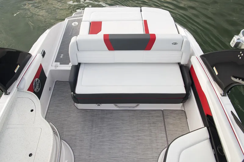 Slide: The Image of Manufacturer Provided Image: 2016 Regal 27 FasDeck RX boat interior with white and red seating. - 11