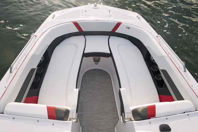 Slide: The Image of Manufacturer Provided Image: 2016 Regal 27 FasDeck RX boat interior with white and red seating. - 8