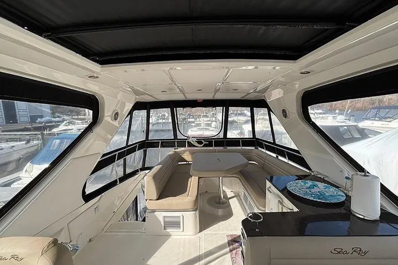 Slide: The Image of Luxurious interior of 2015 Sea Ray 510 Fly yacht with seating and table. - 14
