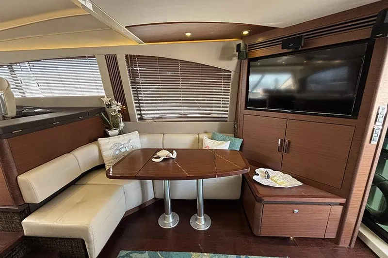 Slide: The Image of Luxurious interior of 2015 Sea Ray 510 Fly yacht with elegant seating and entertainment area. - 17