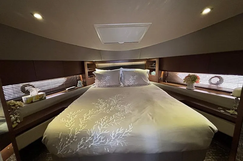 Slide: The Image of Luxurious bedroom interior of 2015 Sea Ray 510 Fly yacht with elegant bedding. - 33