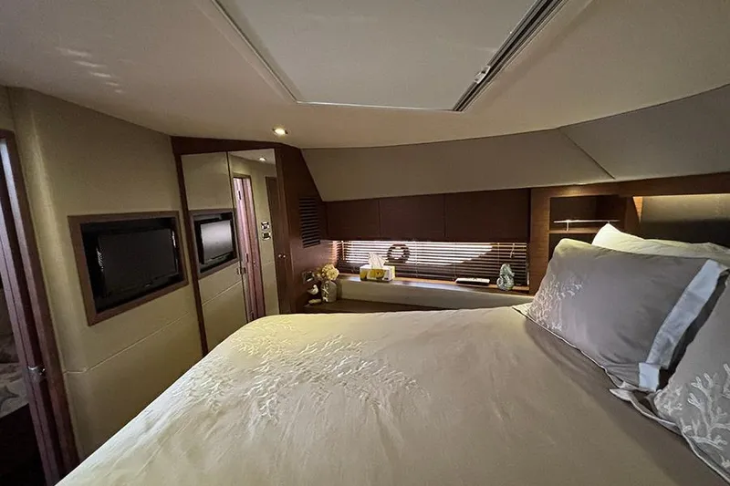 Slide: The Image of Luxurious bedroom interior of 2015 Sea Ray 510 Fly yacht with elegant bedding and decor. - 35