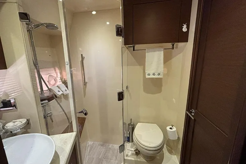 Slide: The Image of Luxurious bathroom in 2015 Sea Ray 510 Fly yacht with modern fixtures and elegant design. - 38