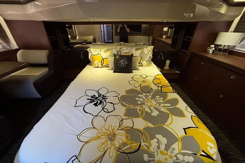 Slide: The Image of Luxurious bedroom interior of 2015 Sea Ray 510 Fly yacht with floral bedding. - 44