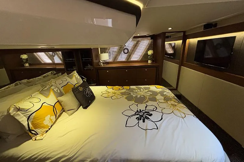 Slide: The Image of Luxurious bedroom interior of 2015 Sea Ray 510 Fly yacht with floral bedding and modern decor. - 46