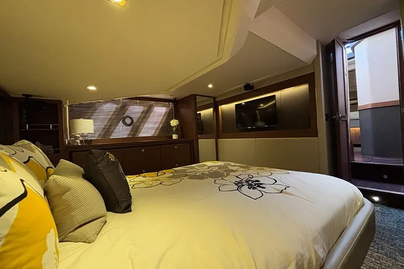 Slide: The Image of Luxurious bedroom interior of 2015 Sea Ray 510 Fly yacht with elegant decor and modern amenities. - 47