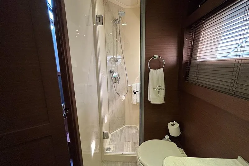Slide: The Image of Luxurious bathroom in 2015 Sea Ray 510 Fly yacht with shower and modern amenities. - 51