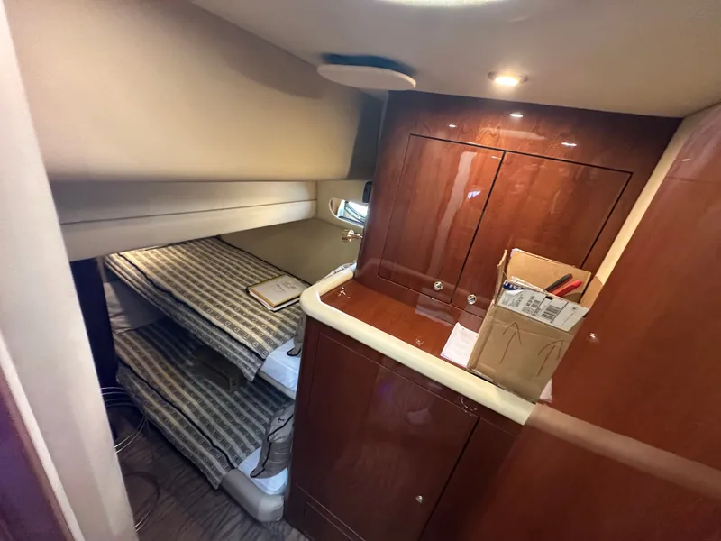 Slide: The Image of Interior of 2002 Sea Ray 560 Sedan Bridge with bunk beds. - 12