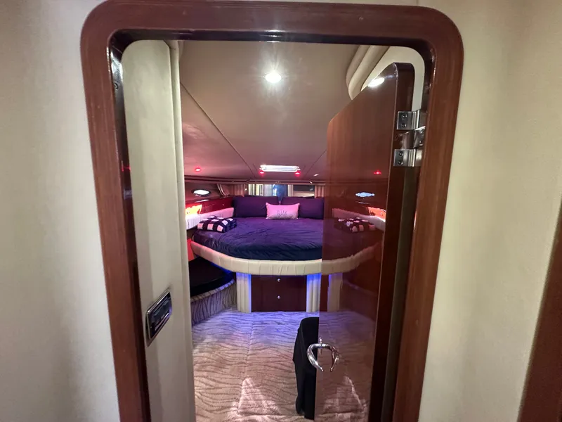 Slide: The Image of Luxurious bedroom on a 2002 Sea Ray 560 Sedan Bridge yacht. - 13