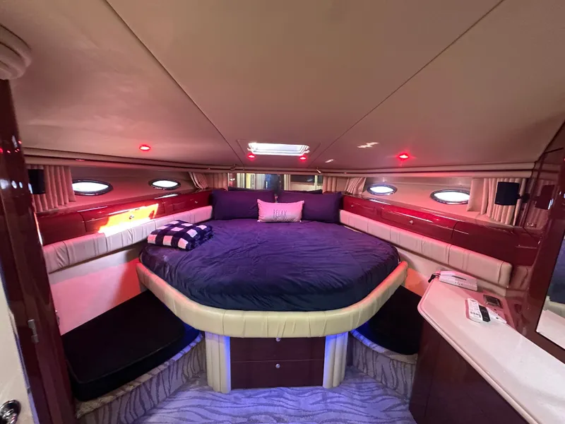 Slide: The Image of Luxurious bedroom in a 2002 Sea Ray 560 Sedan Bridge yacht. - 14