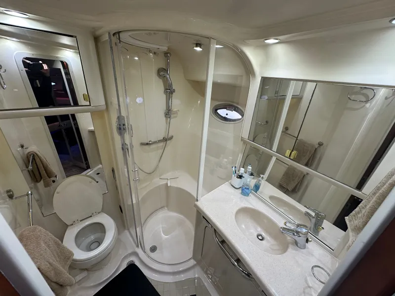 Slide: The Image of Luxurious bathroom on a 2002 Sea Ray 560 Sedan Bridge yacht. - 15