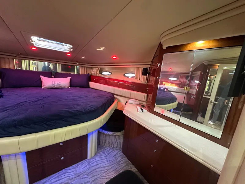 Slide: The Image of Luxurious cabin of 2002 Sea Ray 560 Sedan Bridge with comfortable bed. - 16