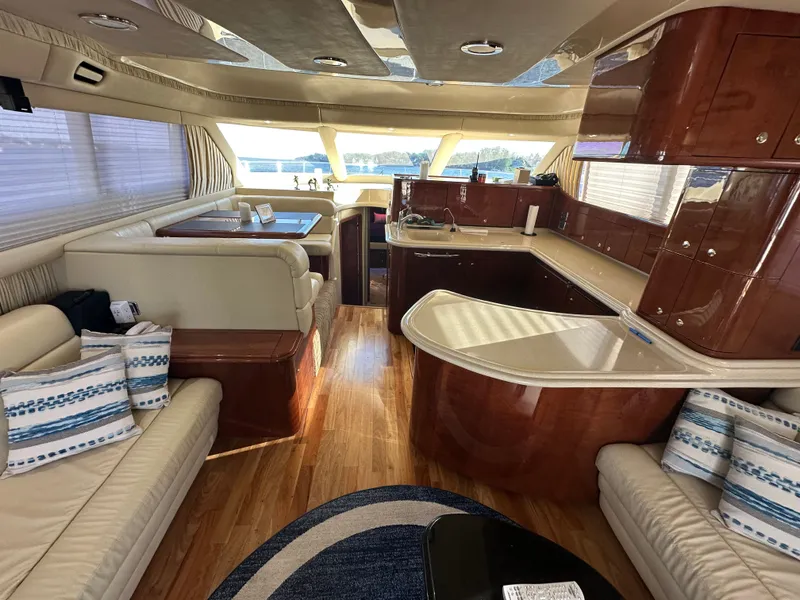 Slide: The Image of Engine room of 2002 Sea Ray 560 Sedan Bridge with red engine. - 19